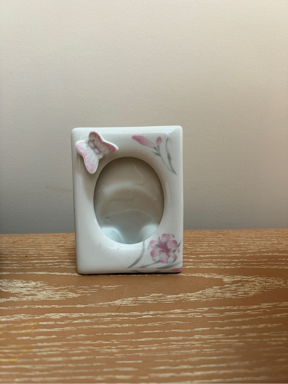 Source Unknown White Porcelain Frame with Pink Butterfly and Floral Accents